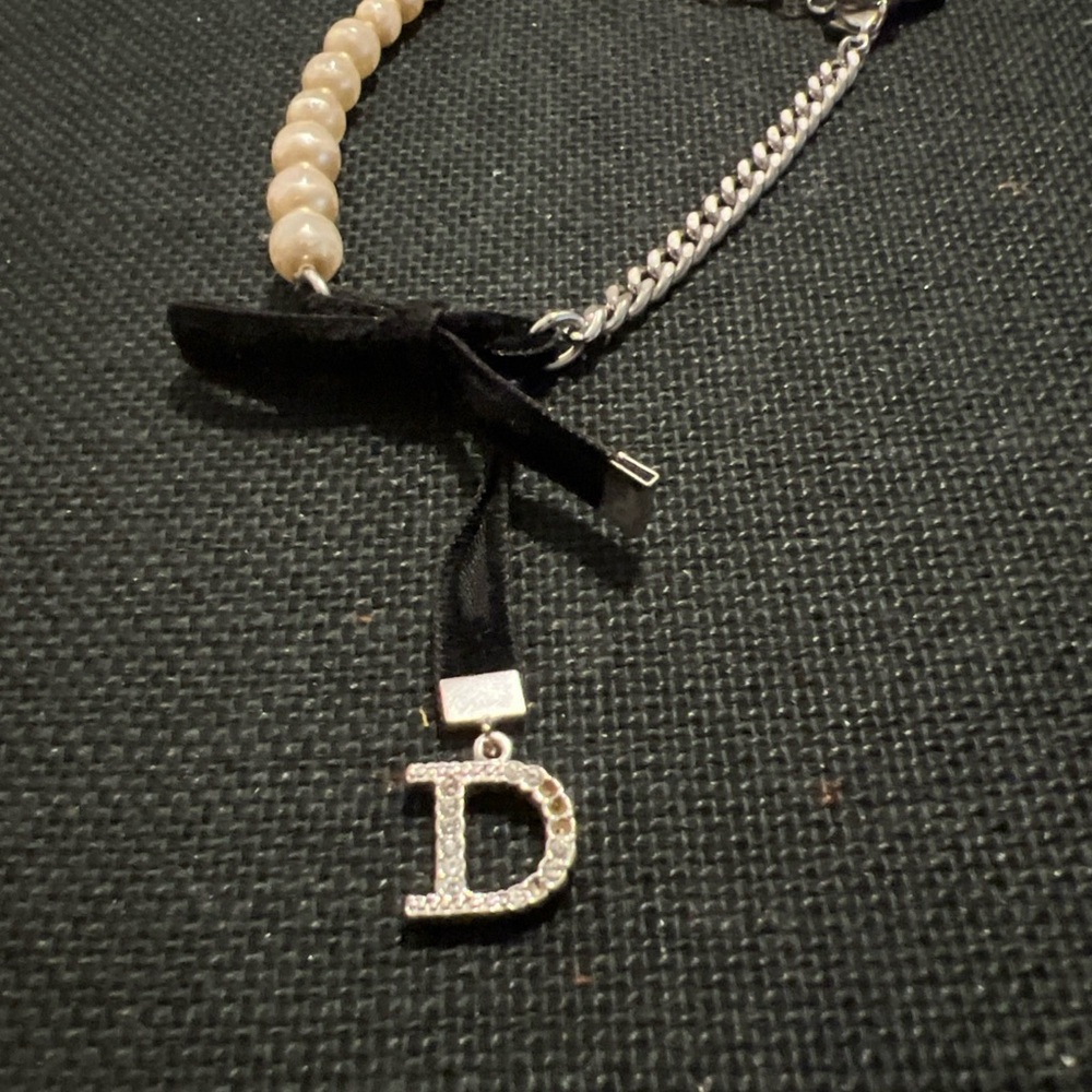 Dior Cream and Black Charm bracelet with Bow - Picture 2 of 7